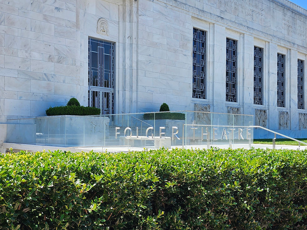 The white art deco Folger Theatre with new glass railings and lettering.