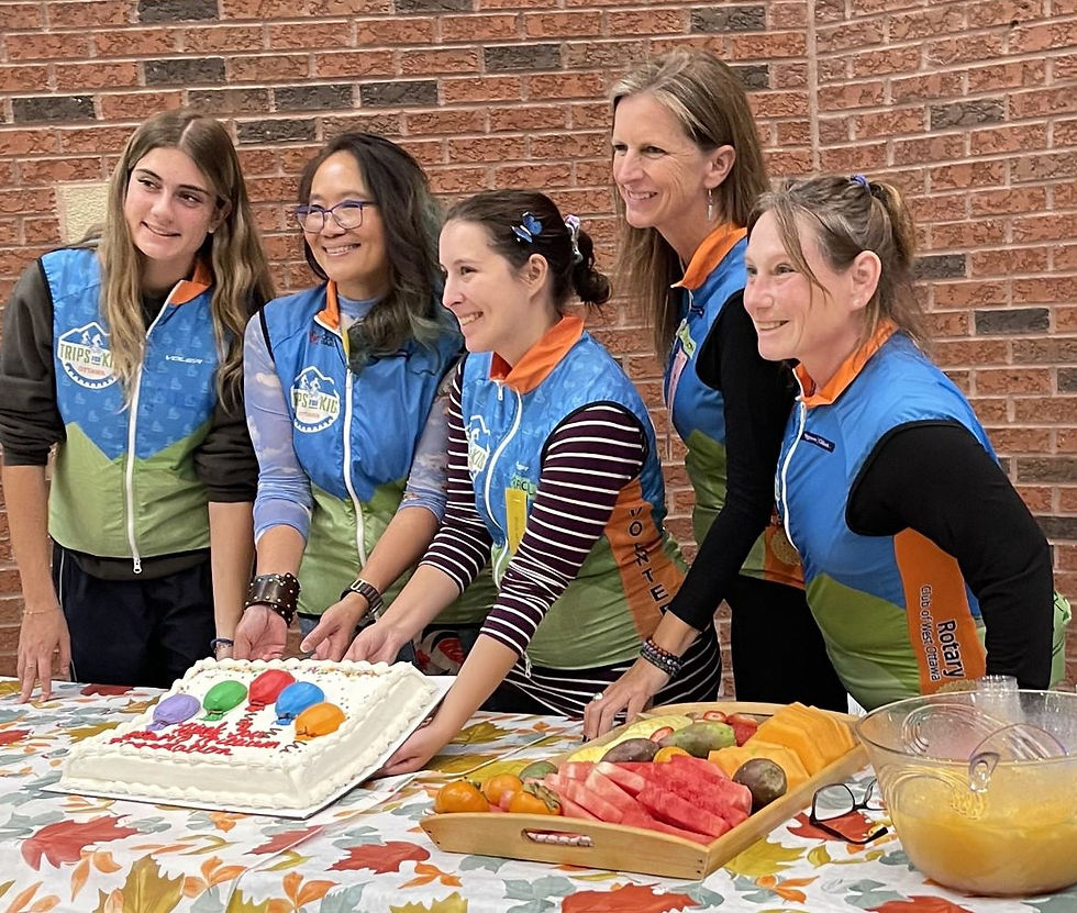 TFKO employees serve cake to show their appreciation of OTF grants