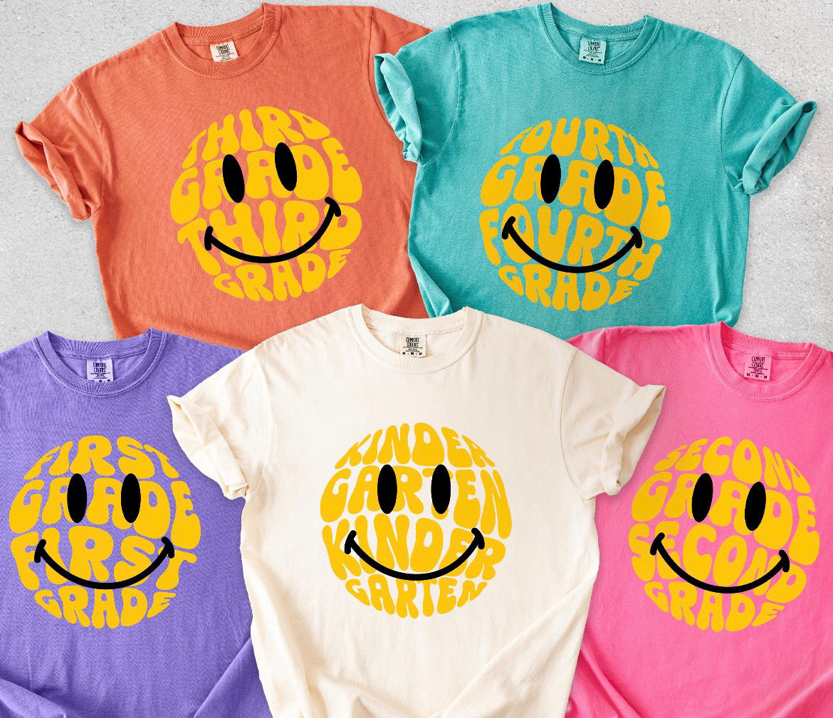 Smiles grade level tshirt