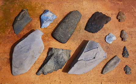 Picture of stone tools and points © Lee Anne Winchester – The Lower Creeks were a highly civilized people engaged in agriculture and grazing. Tools and points made of stone were thought to have been brought with them during their seasonal migrations to the coast. The sample shown here could facilitate the need for piercing, scraping, cutting, and pounding.