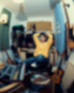 George Moir in a room full of musical instruments.