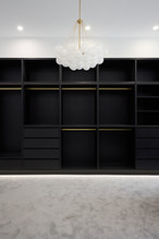 Master walk in robe new build black veneer brass hanging rail