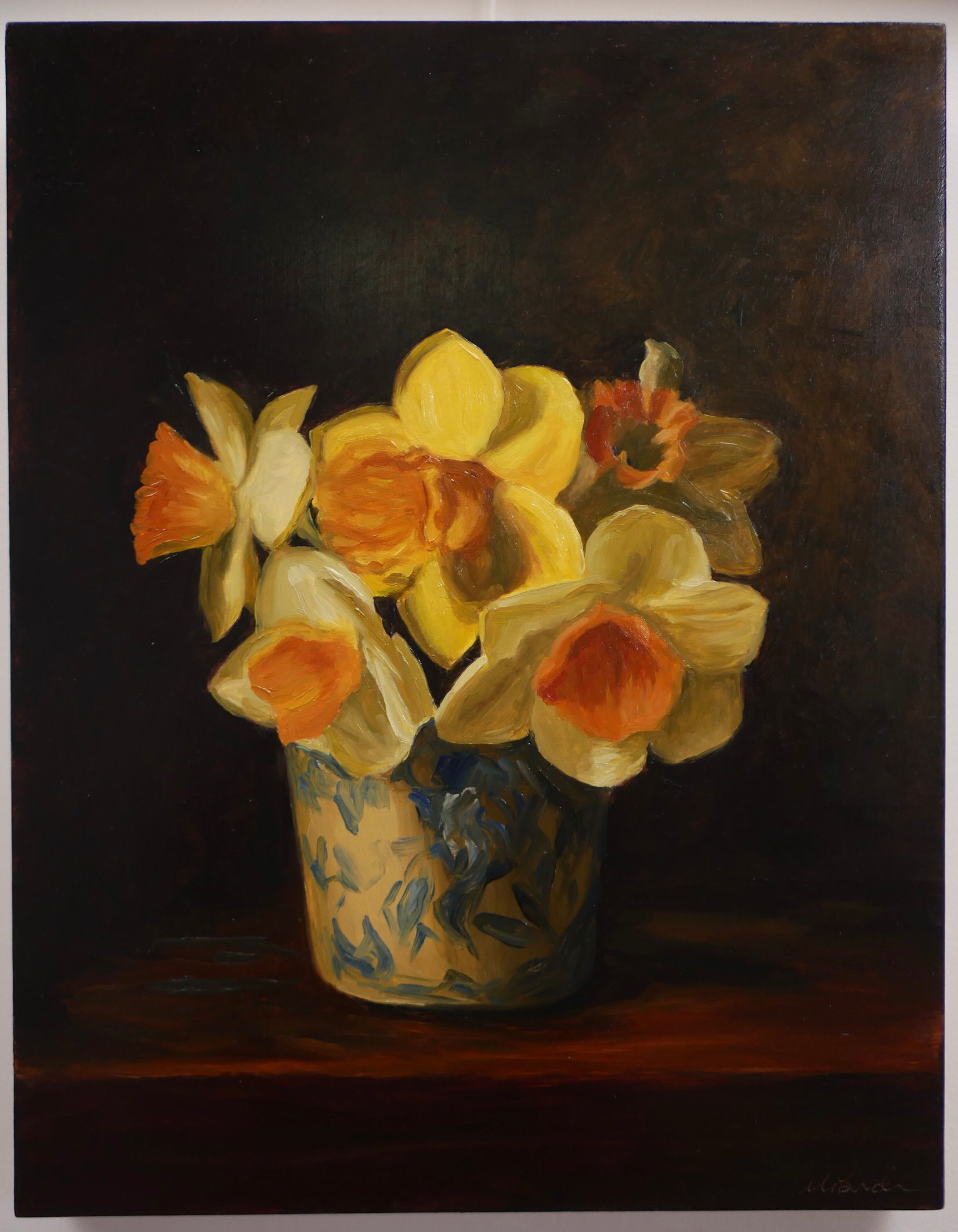 Daffodils in blue and white vase