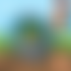 A cartoon hand holding a magnifying glass that is looking at a minecraft block.