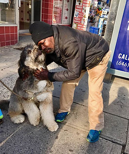 Man hugging dog