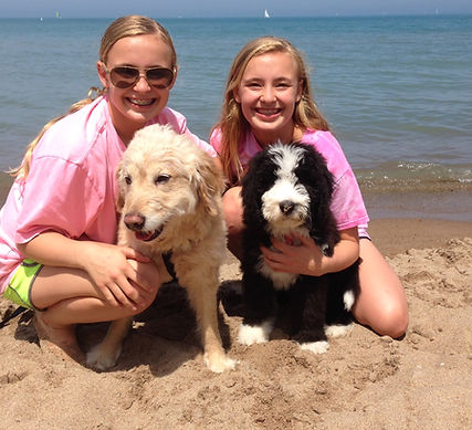 Girls loving puppy