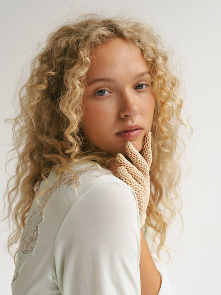 Babette styled by Ryan in a lace dress with lace gloves and big curls