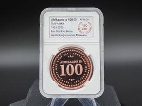 Afrikaans is 100 Muntbekendstelling Breek Rekords – Trump VersekerGeskiedkundige Munt No. 47