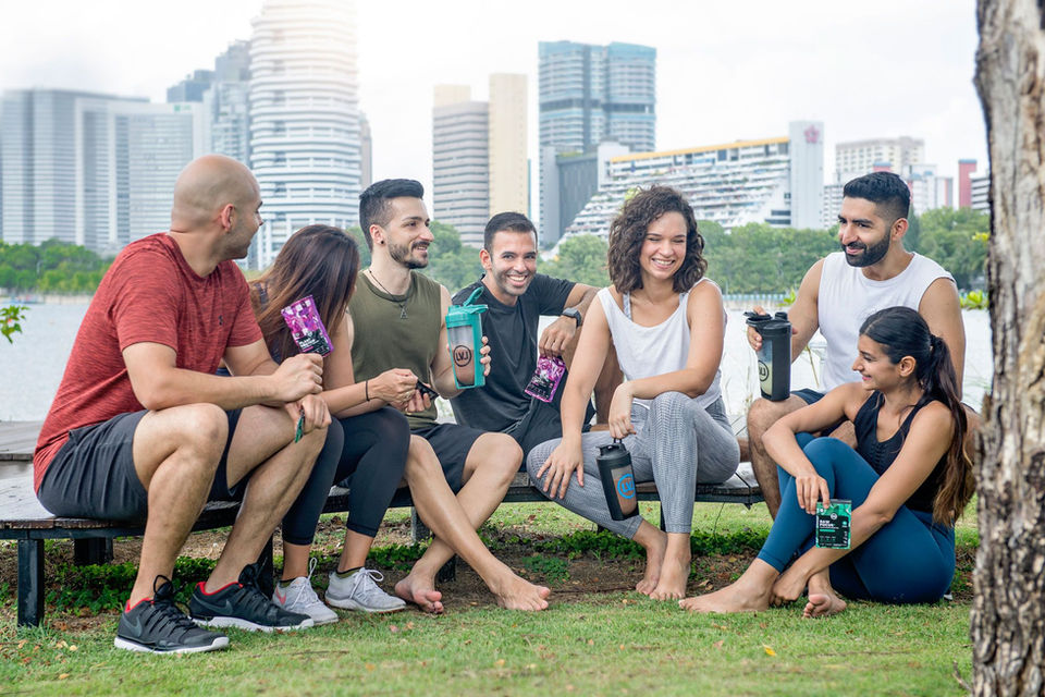 Rohit Nanwani and Avinash Aswani LVL Life Co-founders pose with target group at the Stadium Riverside Walk, National Stadium Singapore
