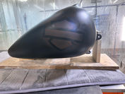 Custom ghost image of Harley Davidson badge added to fuel tank