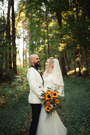 Patrick and Tanja sharing a quiet forest wedding portrait
