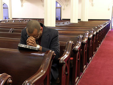 man praying alone canstockphoto546827.jpg