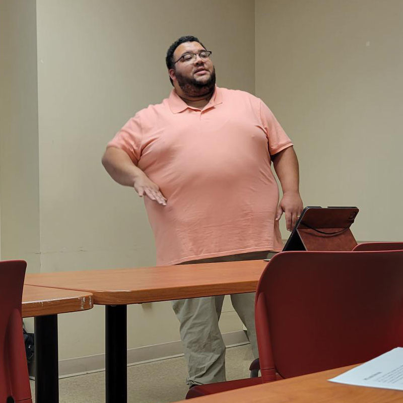 A photo of John Broadus, mental health specialist co-leading the QPR Training.
