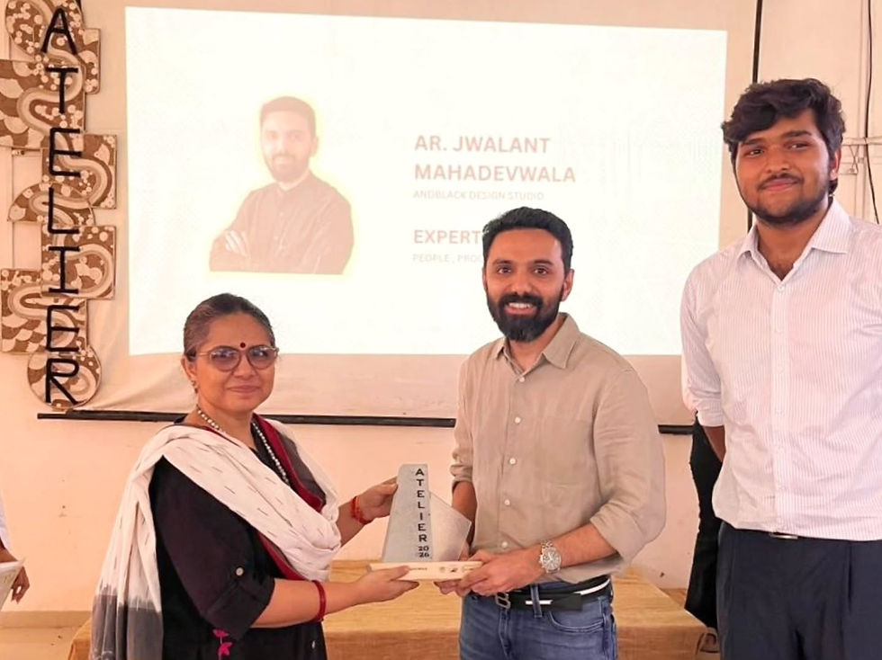 Jwalant receives a momento for his talk at MSU Baroda