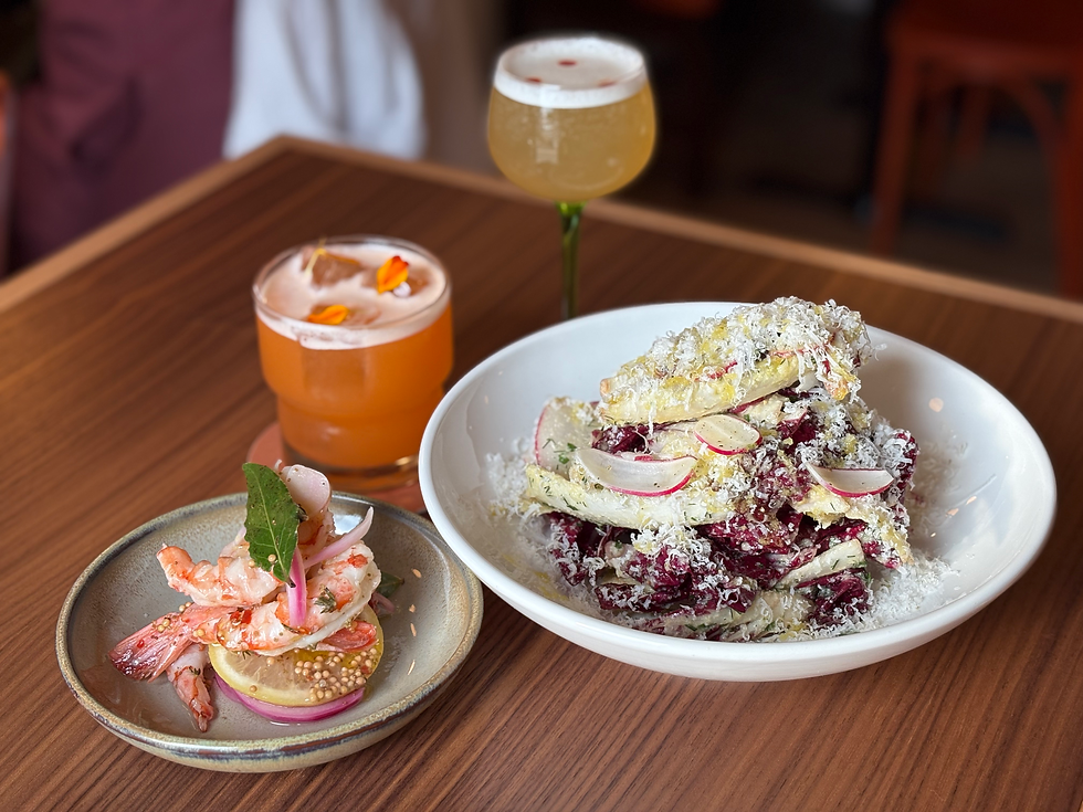 two cocktails and starters complementing each other from size to colours