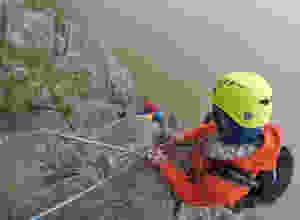 Jamie belaying on Cneifion Arete