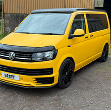 Polished bright yellow VW Transporter after a deep clean package in Dundee