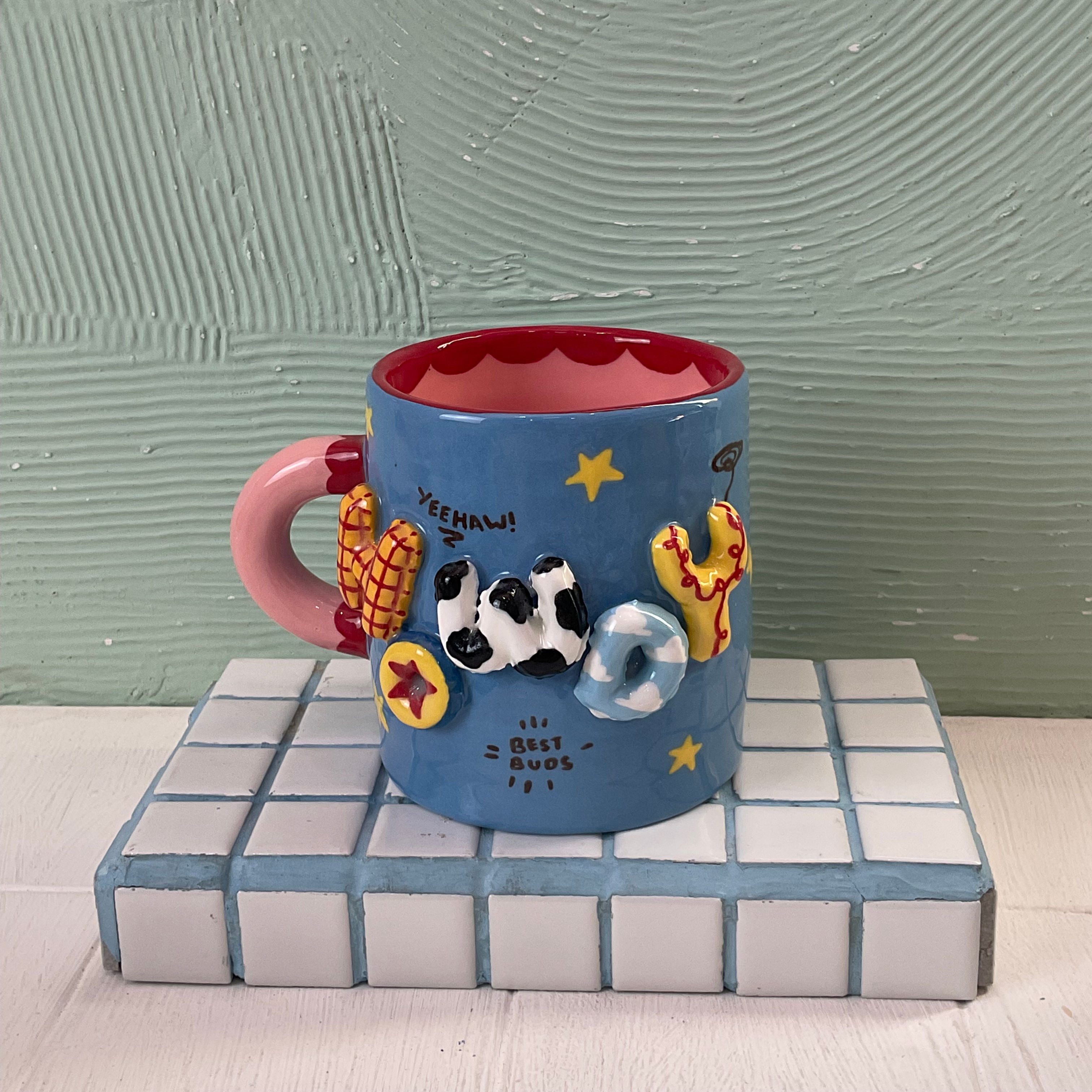 “Howdy” Woody’s Mug