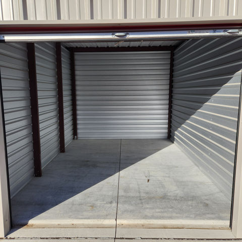 APB Storage unit size 10x15 red doors outside view
