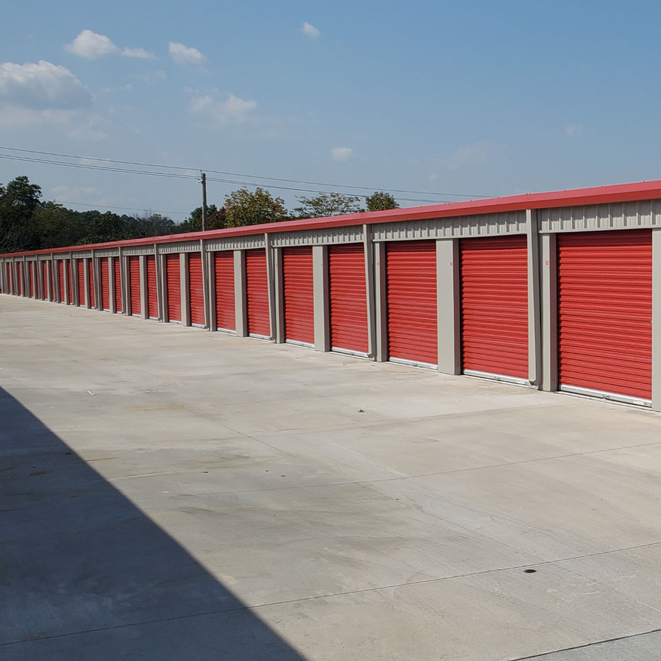 APB Storage unit size 10x30 red doors outside view