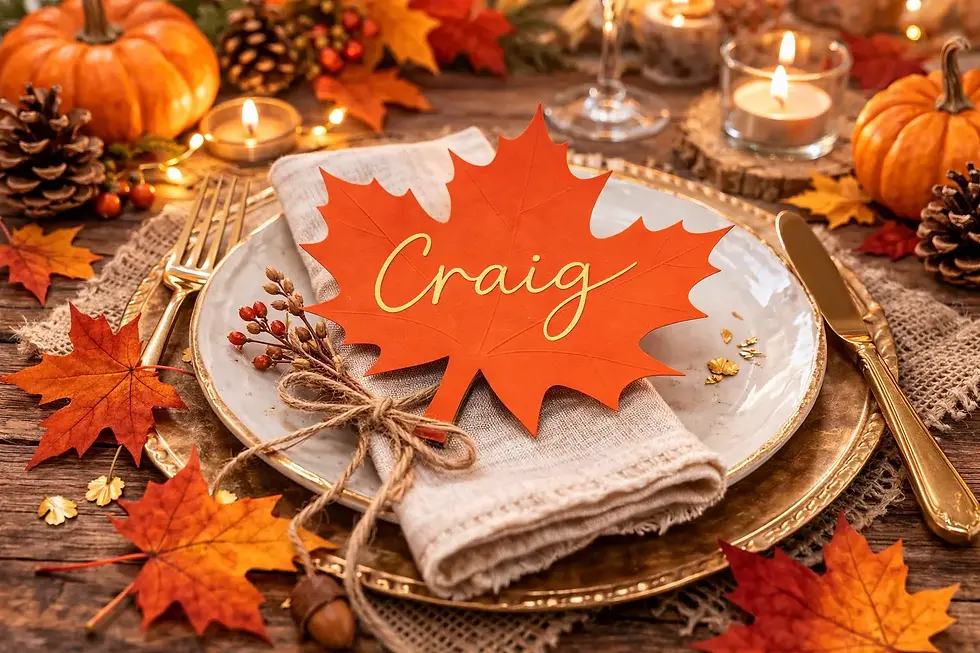Thumbnail: Orange maple leaf place card on a rustic autumn table with pumpkins, pinecones, candles, and gold cutlery.