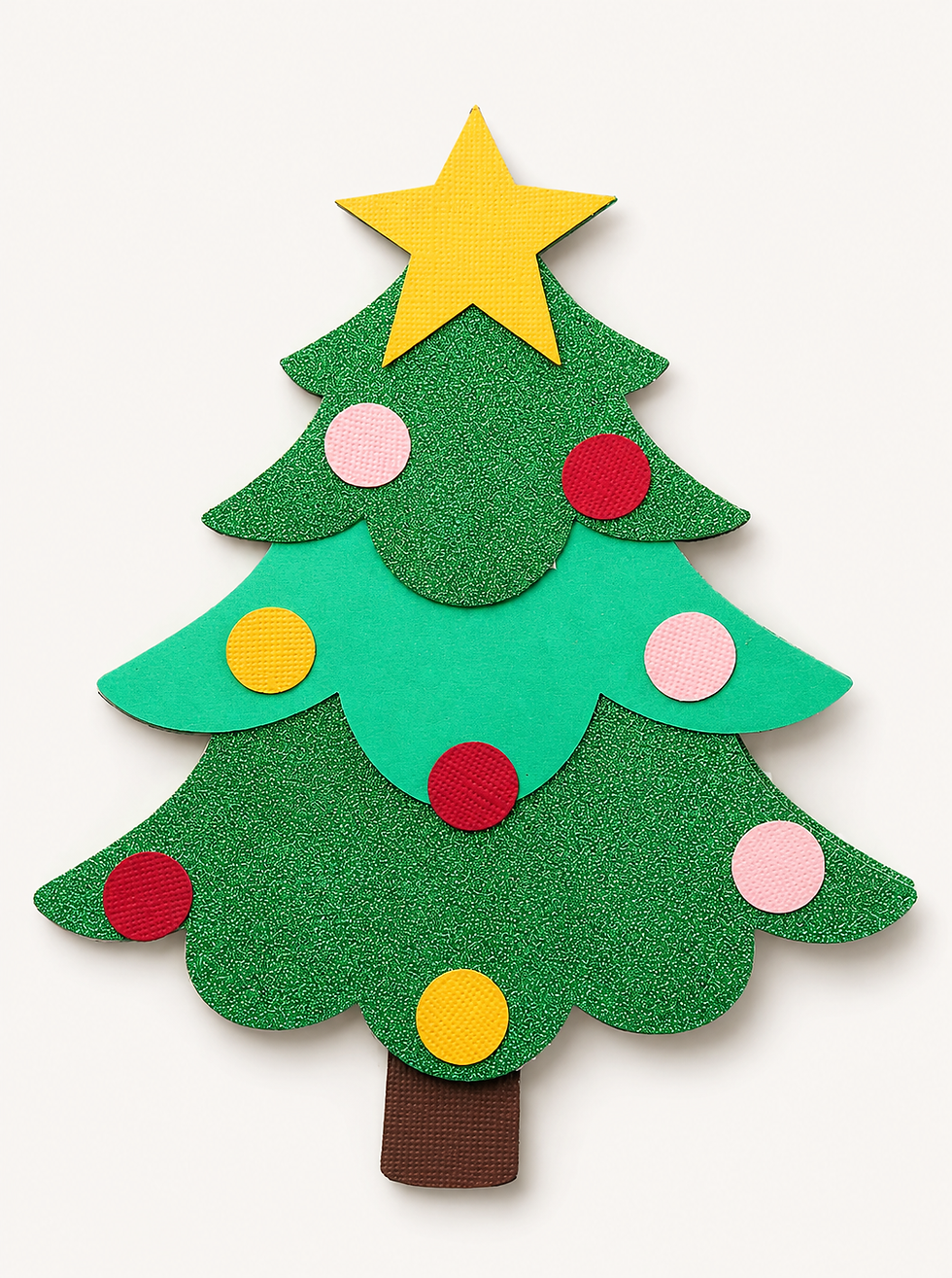 A vibrant, three-dimensional Christmas tree crafted from green felt or paper, topped with a bright yellow star
