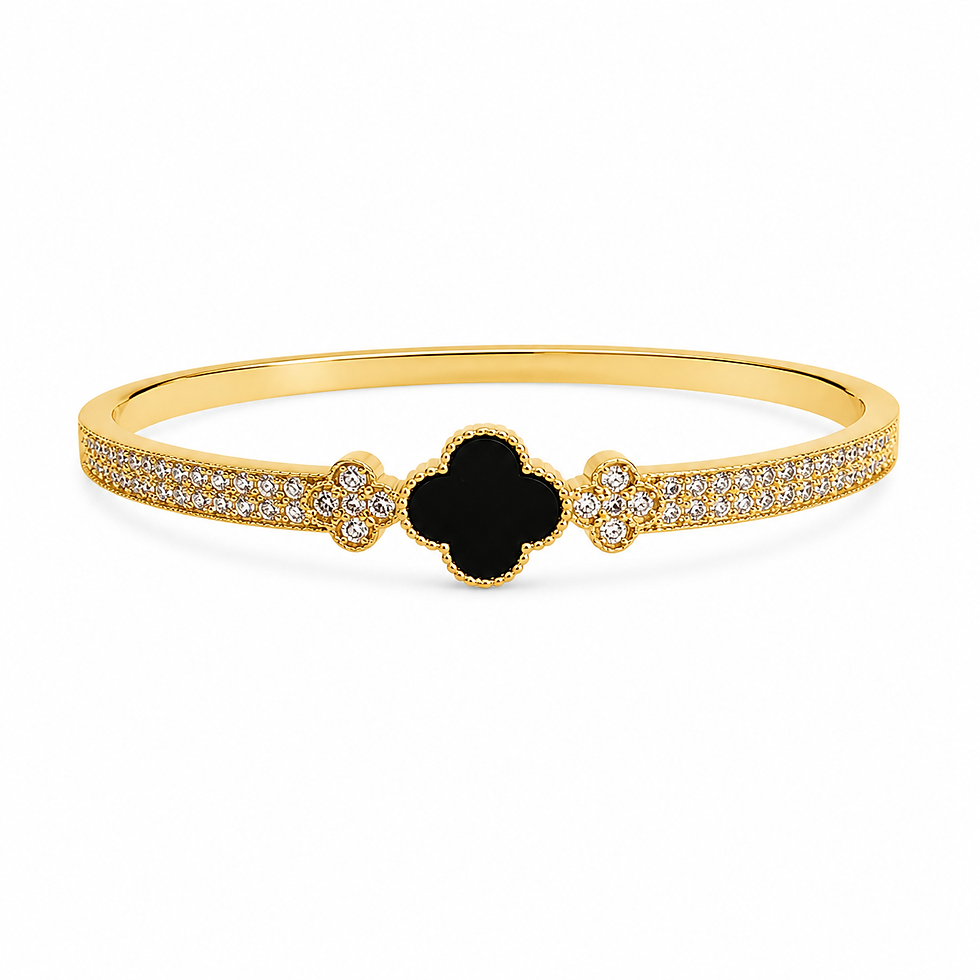 18K gold plated clover bracelet with black enamel center and pavé crystals on a white background
