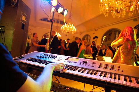 pianist at party Julie Bougher.jpg