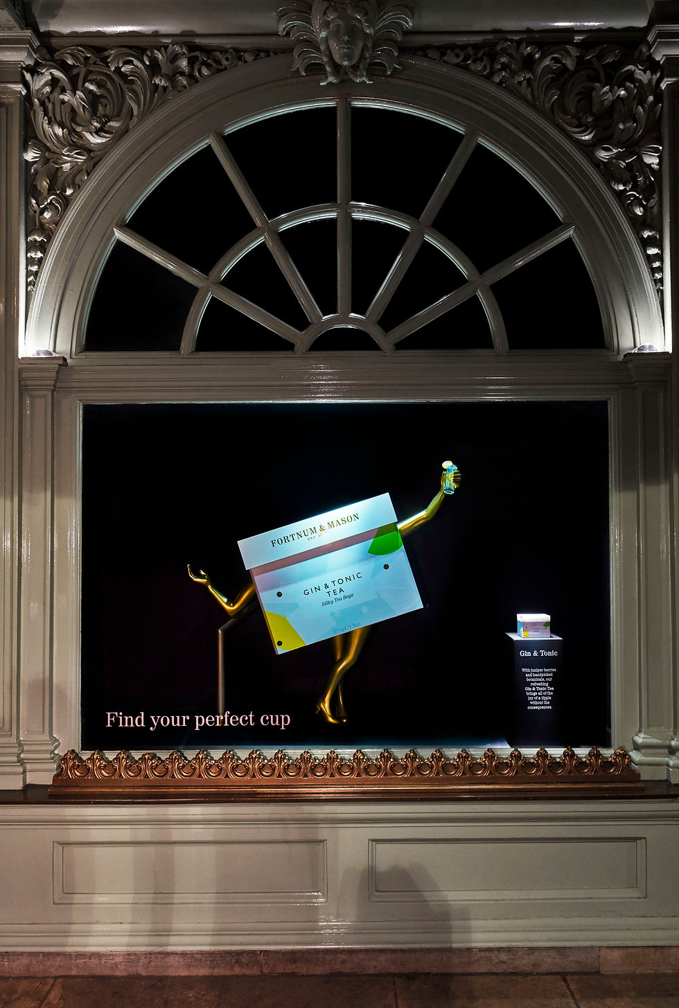 Fortnum and mason window display tea fruity tea display visual merchandising display design