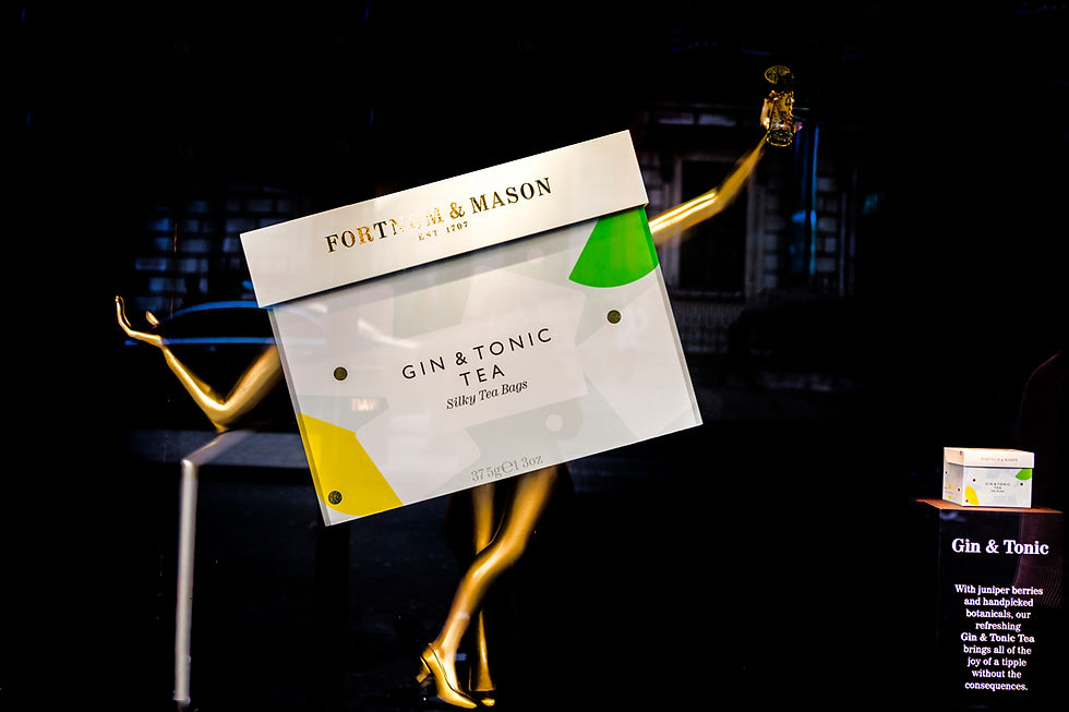 Fortnum and mason window display tea fruity tea display visual merchandising display design