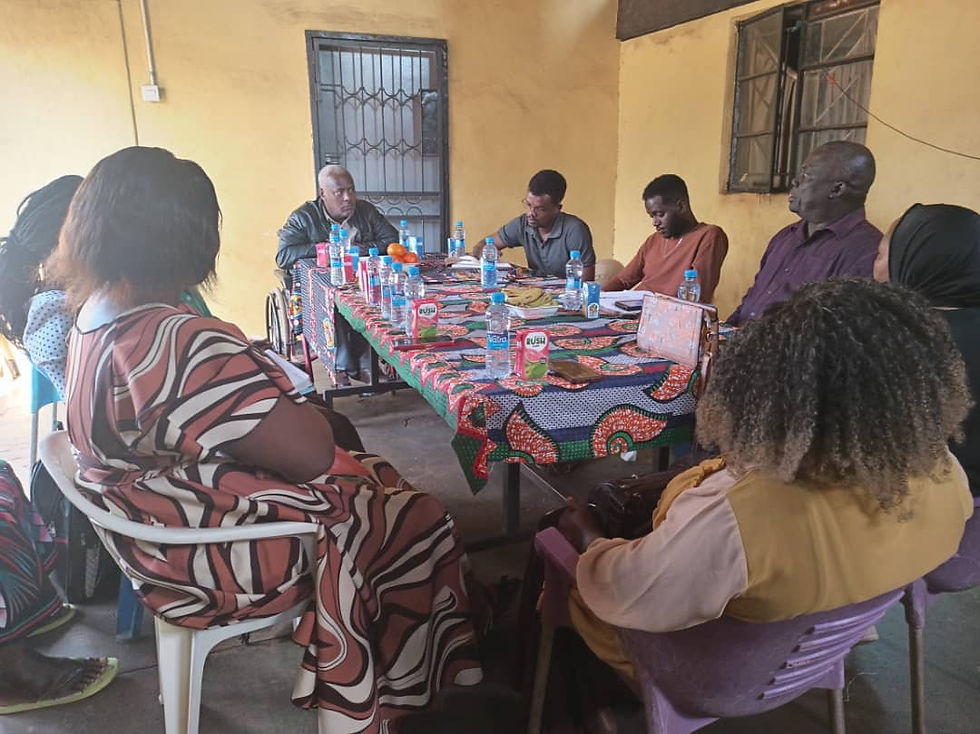 Eye-level view of a community hall set up for a disability advocacy workshop
