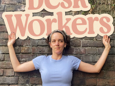 A woman demonstrating a wall angel stretch