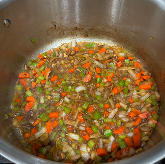 Done simmering when the broth looks like this and the poultry is soft and shred and sausage softened