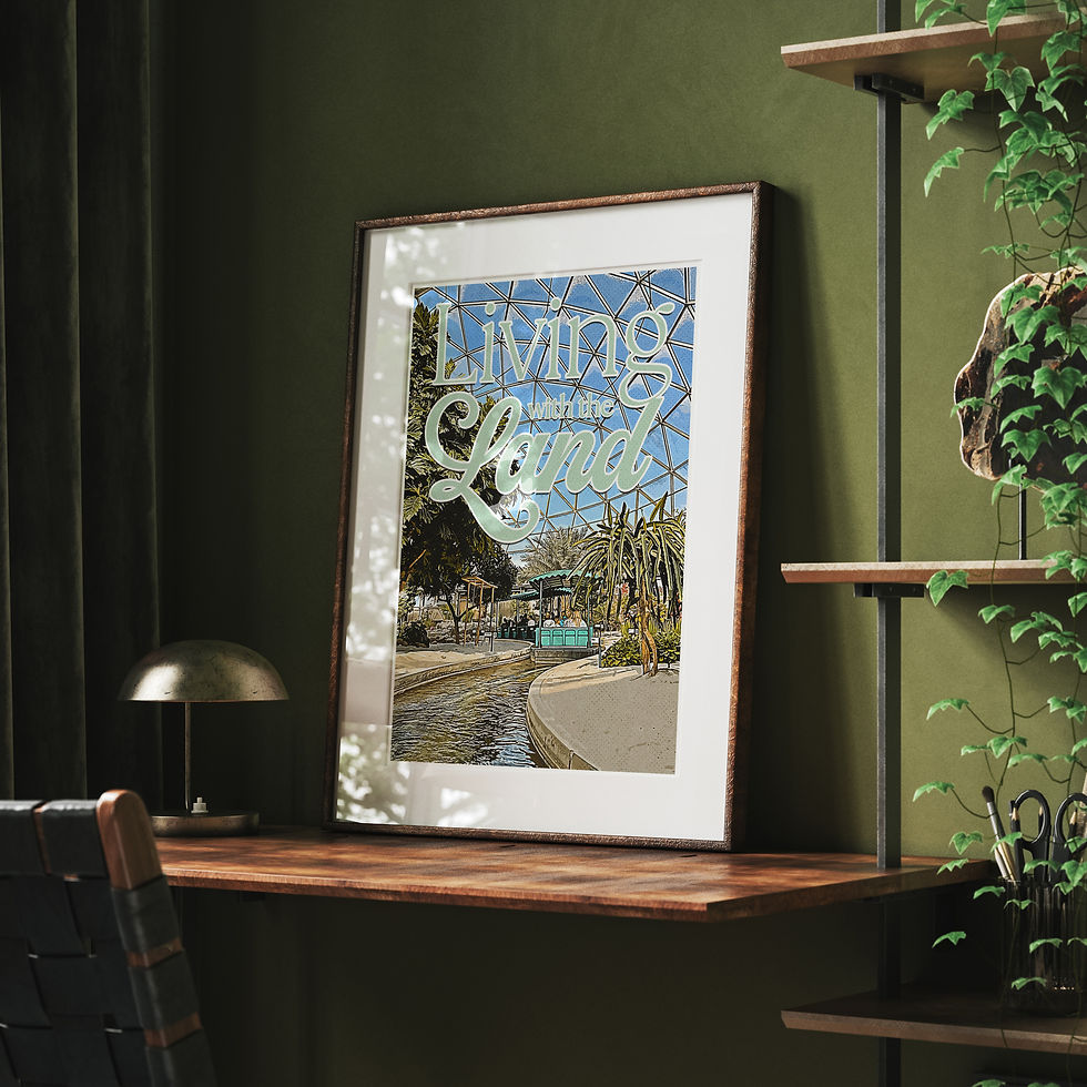 Thumbnail: Framed Living with the Land poster resting on a dark wood desk against a dark green wall in a moody, modern home office setti