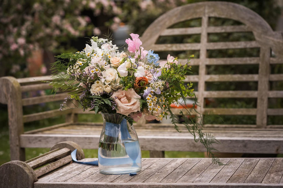Stunning Bridal Bouquet made from beautiful pastel spring flowers. Bride wedding flowers hand-tied with silk ribbon from a Somerset Wedding.