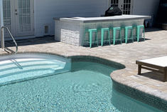 Outdoor Kitchen Remodel by Maison Vue Home. Custom Concrete Countertops made to size and in gray finish. 