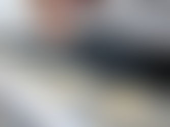 Professional roofer installing architectural shingles on Pittsburgh home with proper flashing and ventilation systems