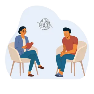 Professional psychiatrist discussing OCD treatment options with patient in comfortable Greensburg PA office setting