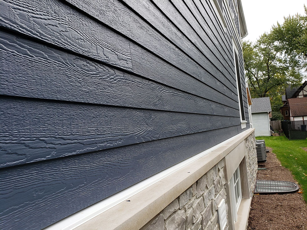 Energy efficient siding materials display showing insulated vinyl and fiber cement options for Pennsylvania homes