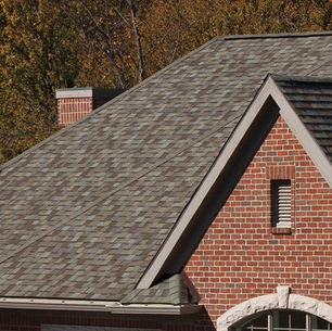 Comparison of 25-year vs 50-year roof shingles showing material differences for Pennsylvania climate conditions