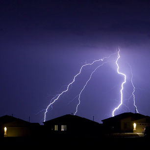Storm damaged roof in Irwin PA showing missing shingles and insurance claim documentation requirements