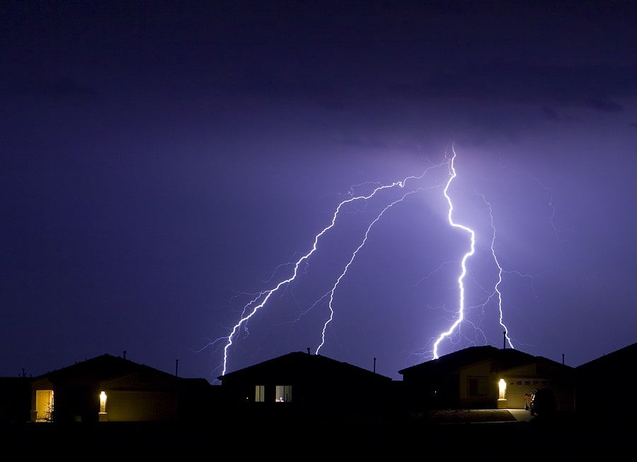 Storm damaged roof in Irwin PA showing missing shingles and insurance claim documentation requirements
