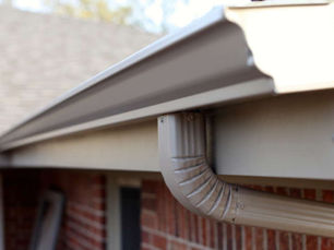 Seamless gutters installed on a Pittsburgh home by Craig Gouker Roofing, protecting fascia from water damage