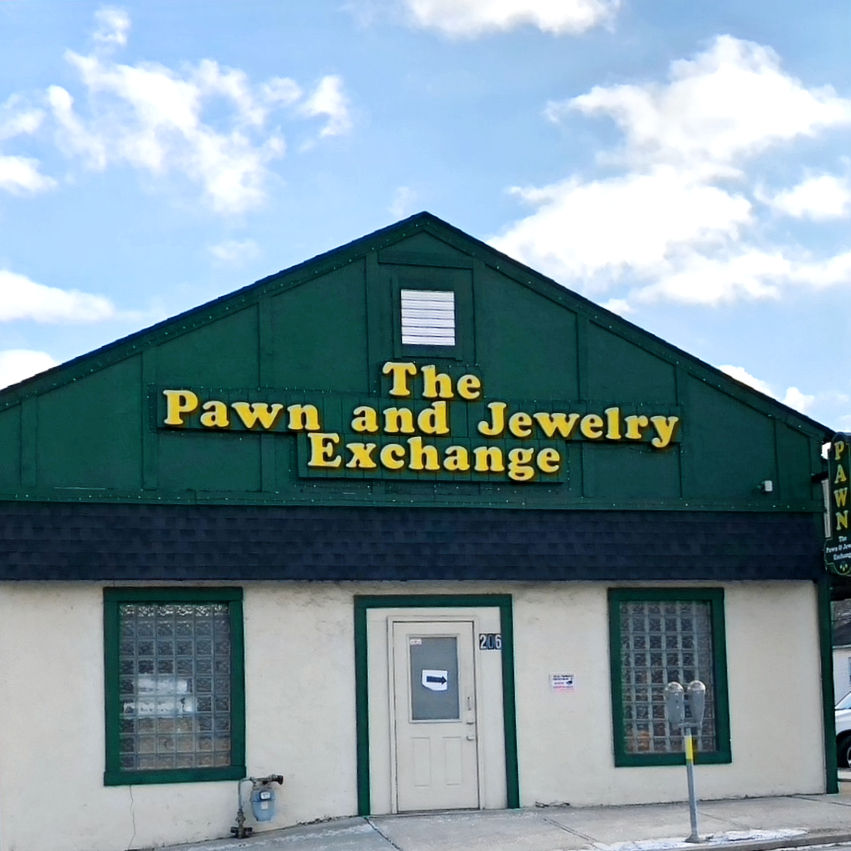 Pawn shop counter showing how does a pawn shop work Greensburg PA with items being evaluated