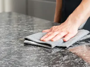 Beautiful granite vs quartz countertops comparison in modern Greensburg PA kitchen remodel
