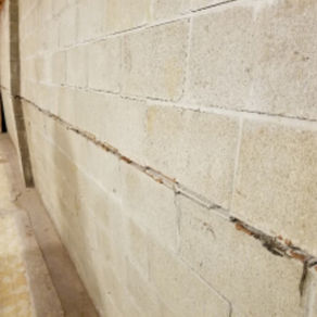 bowed basement, bowed wall, basement problem, structural repair