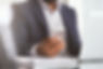 close-up-hand-of-businessman-using-phone-2021-04-03-13-38-42-utc.jpg