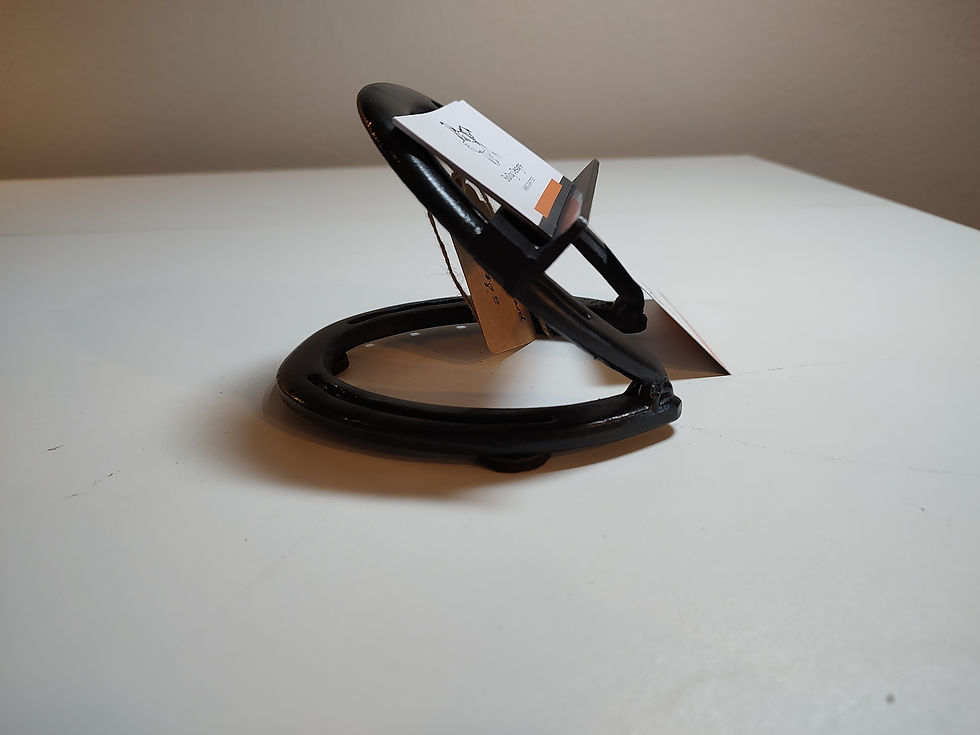 Side view of horseshoe business card holder.