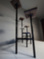 Bottom view of walnut three tier plant stands