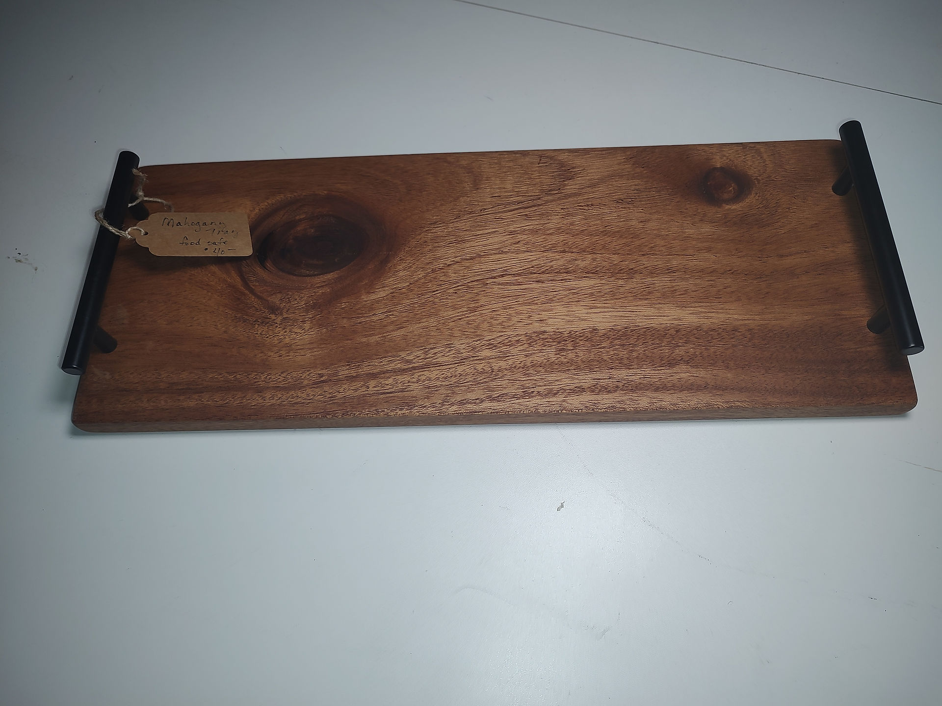 Mahogany adds a different hue with great wood grain .